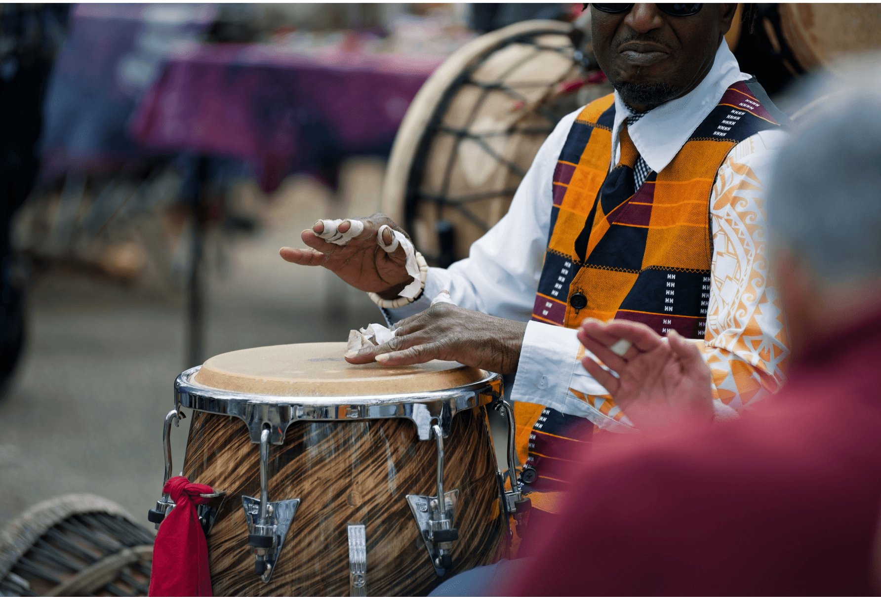 Community members drumming together